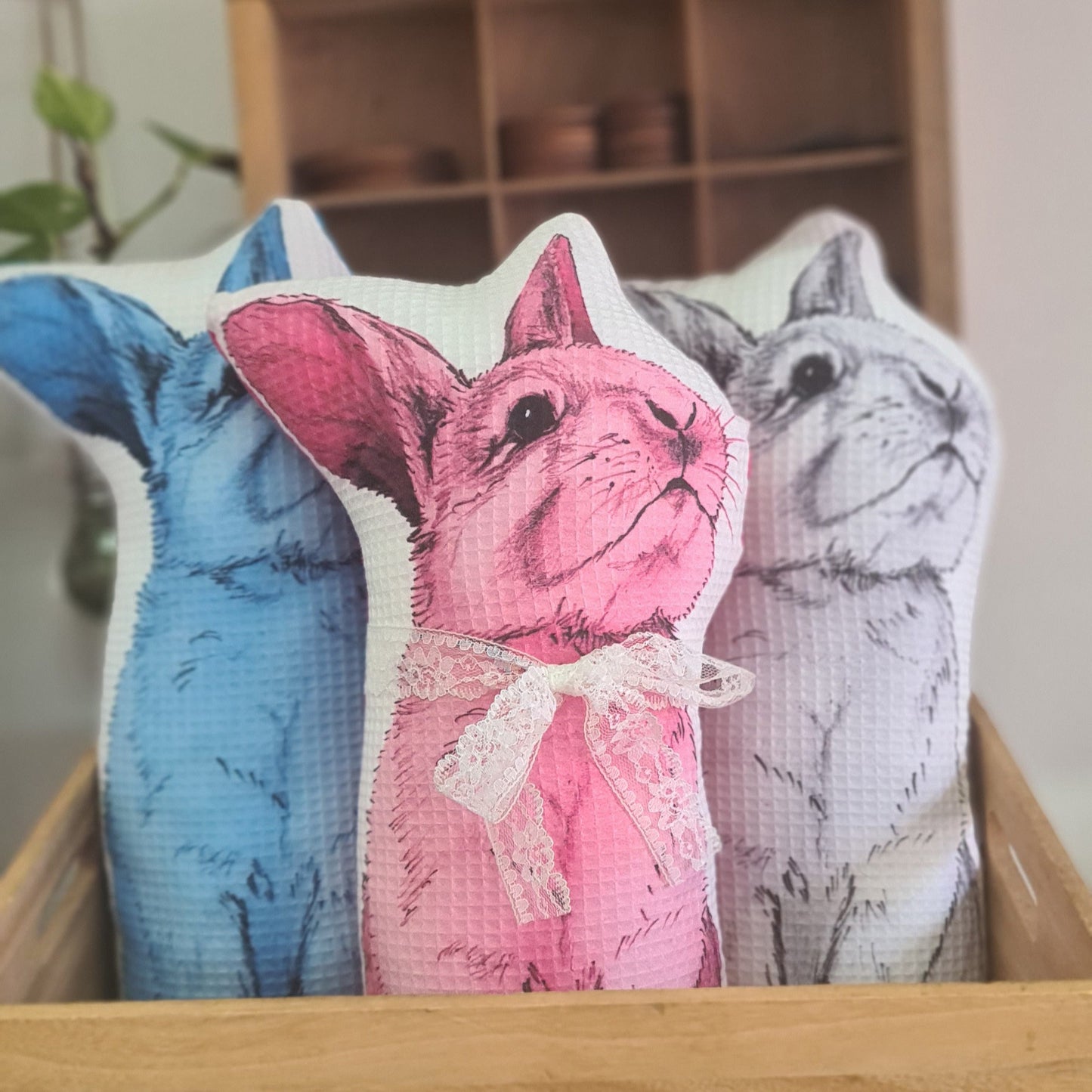 Illustrated decorative pillow of a girl with a rabbit